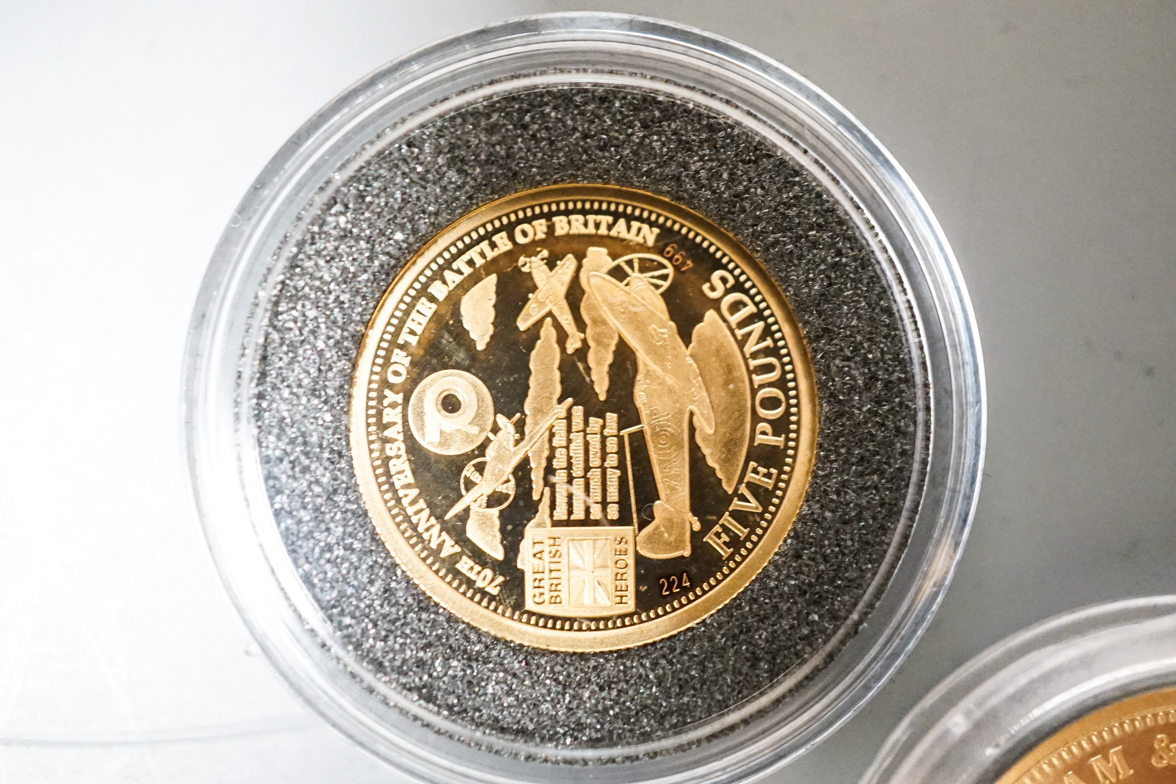 A London mint Tristan da Cunha proof gold sovereign and a similar proof gold Battle of Britain coin, cased with certificates (2)